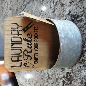 Laundry sign with storage bin